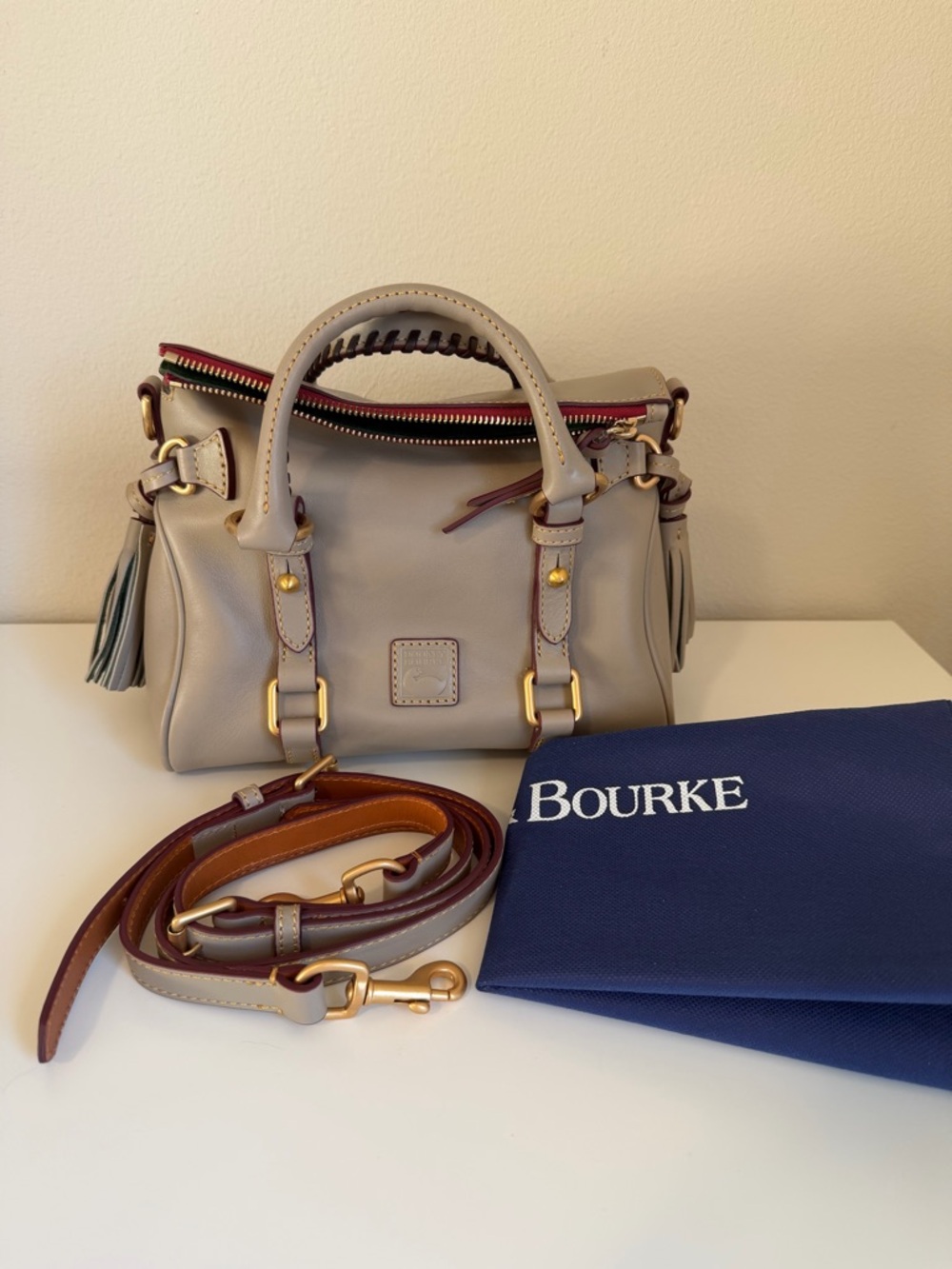 Dooney & Bourke Micro Florentine Satchel in the color light taupe